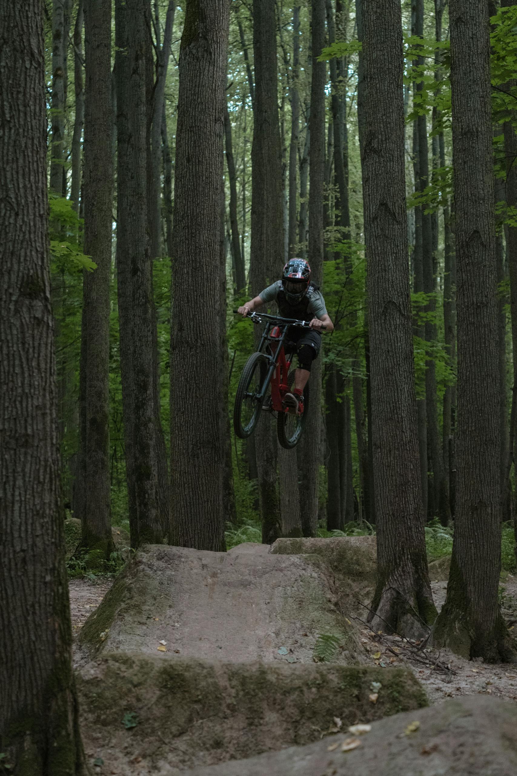 A Person on a Mountain Bike Mid Air